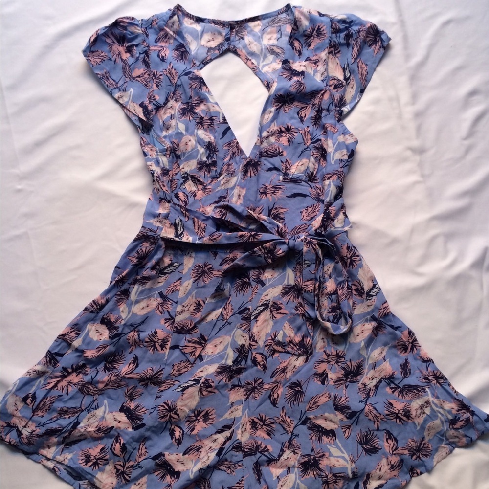 Blue romper with pink palm tree design